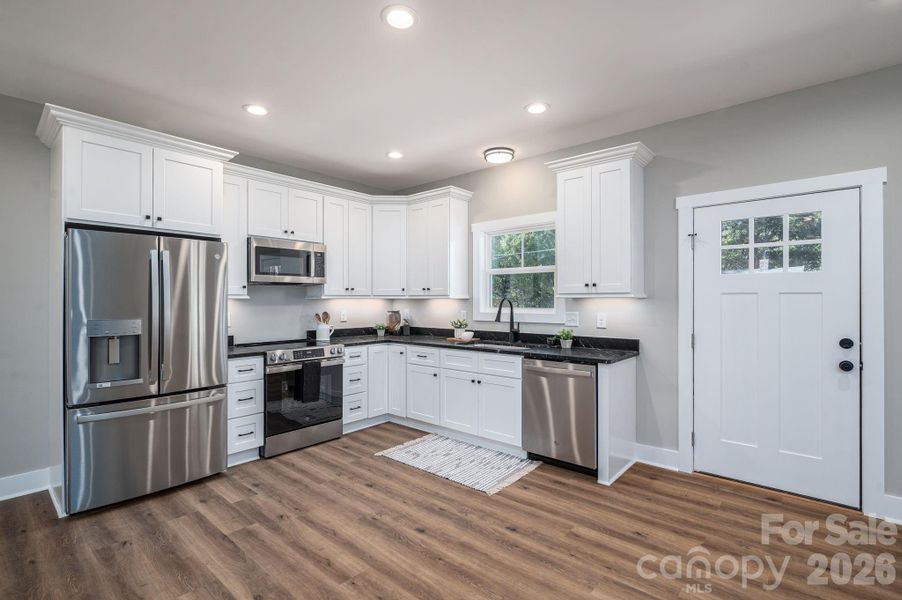 Furnished interior view inside a new home in , Lowell (Image 5).