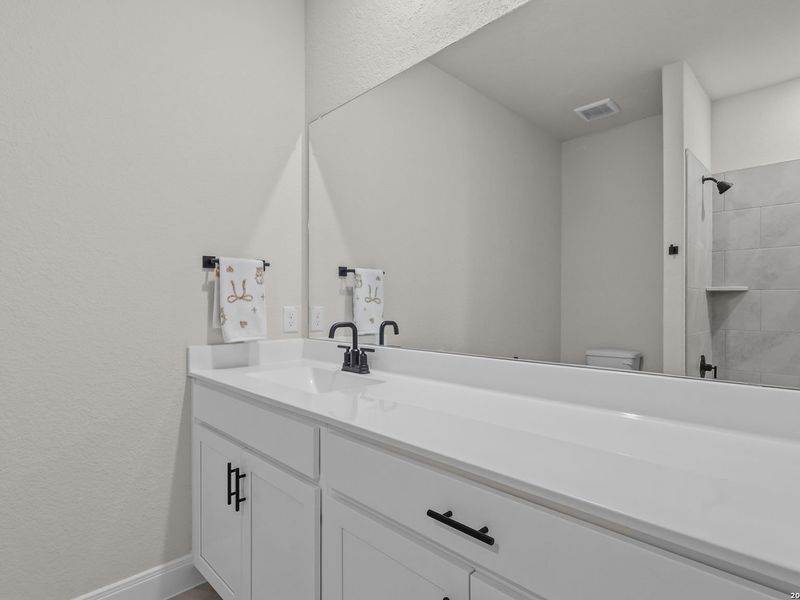 Furnished interior view inside a new home in The Reserve at Potranco Oaks, Castroville (Image 35).