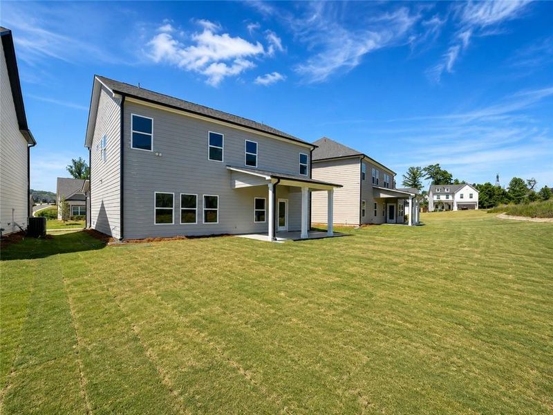 Exterior details and patio area of a home in Ponderosa Farms Estates, Gainesville (Image 21).