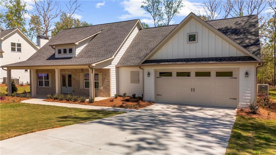 Front exterior of a new home in , Gainesville, GA, highlighting curb appeal (Image 24).