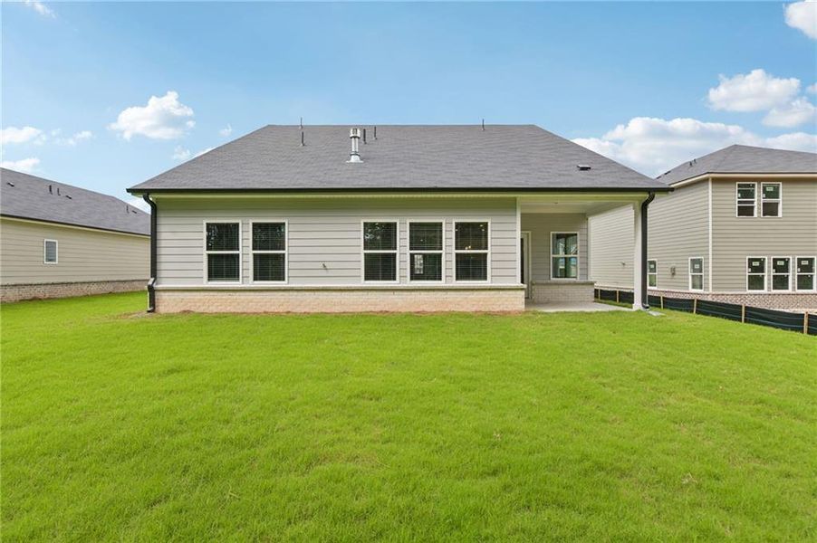 Exterior details and patio area of a home in Parkside at Grayson, Grayson (Image 28).