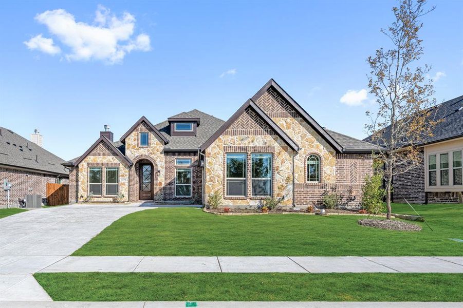 Front exterior of a new home in Meadow Vista 60-65, Anna, TX, highlighting curb appeal (Image 1). Front exterior of a new home in Meadow Vista 60-65, Anna, TX, highlighting curb appeal (Image 1).