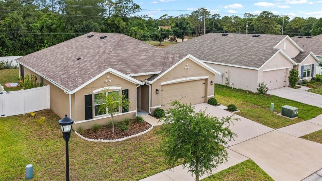 Front exterior of a new home in Brookside, Ruskin, FL, highlighting curb appeal (Image 26).