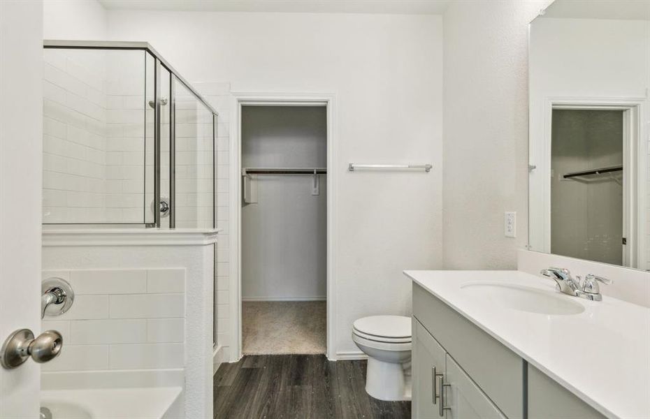 Owner's bath with dual vanity and oversized shower*real home pictured