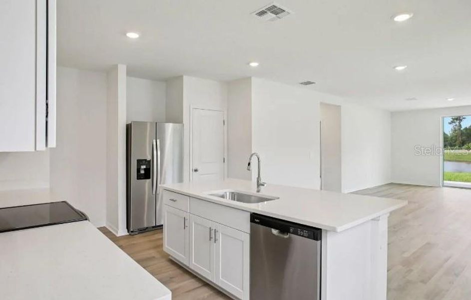 Furnished interior view inside a new home in Magnolia Bay - Premier Series, Nokomis (Image 5). Furnished interior view inside a new home in Magnolia Bay - Premier Series, Nokomis (Image 5).