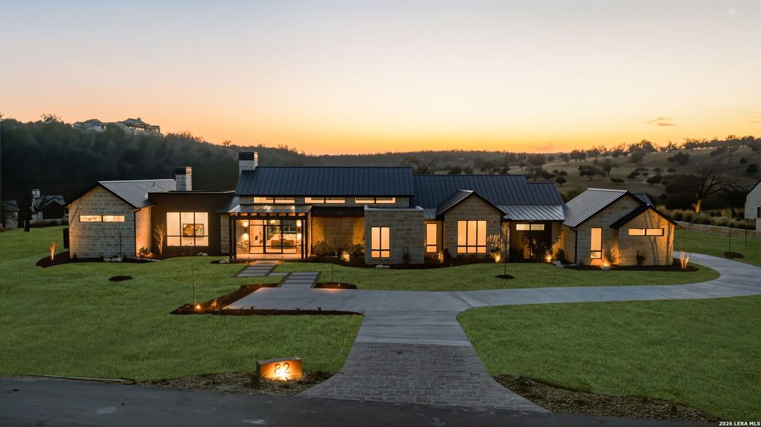 Front exterior of a new home in , Fredericksburg, TX, highlighting curb appeal (Image 2). Front exterior of a new home in , Fredericksburg, TX, highlighting curb appeal (Image 2).
