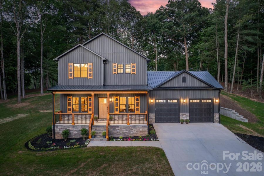 Front exterior of a new home in , Granite Falls, NC, highlighting curb appeal (Image 1). Front exterior of a new home in , Granite Falls, NC, highlighting curb appeal (Image 1).