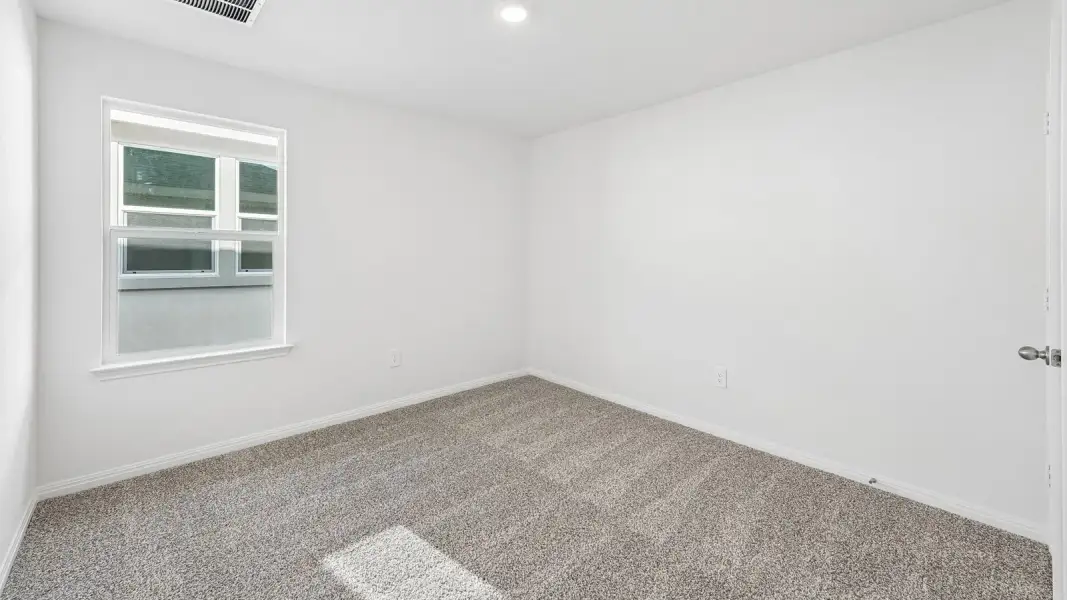 Spacious, unfurnished interior of a new home in Bar W Ranch, Leander (Image 30).