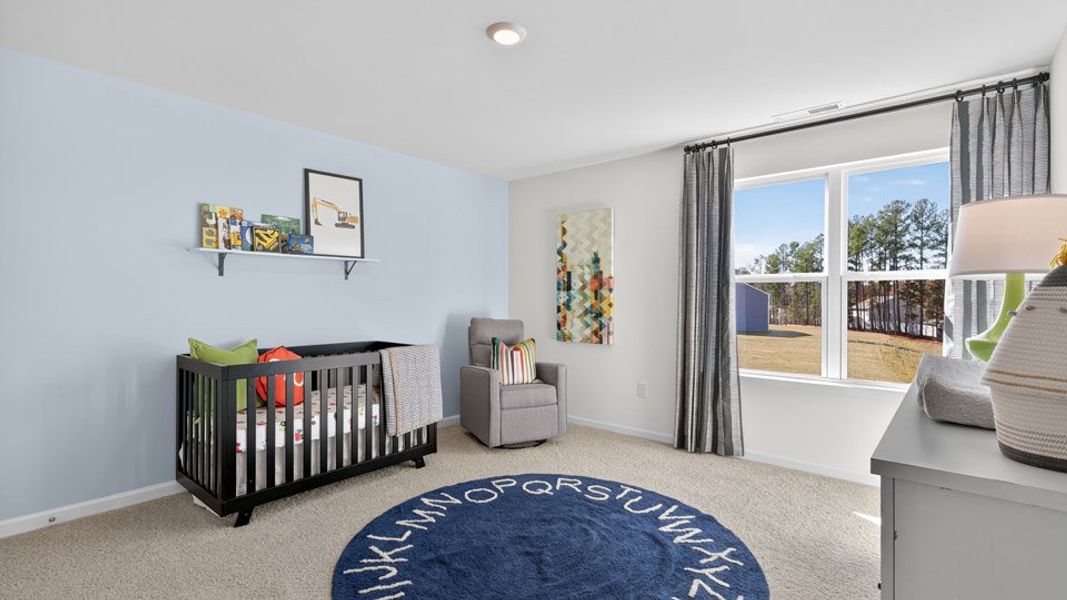 Representative furnished interior of a home built from the Penwell by D.R. Horton in Mangum Farms, Stem (Image 14).