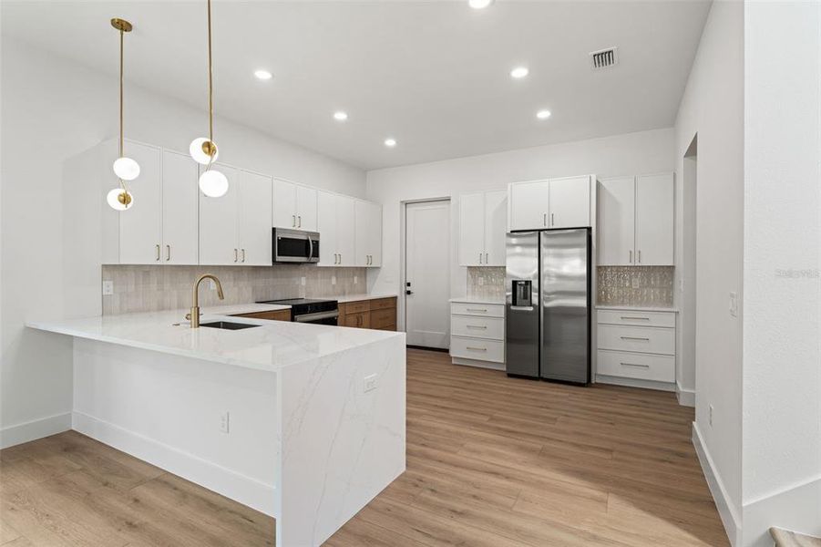 Furnished interior view inside a new home in , Tampa (Image 10).