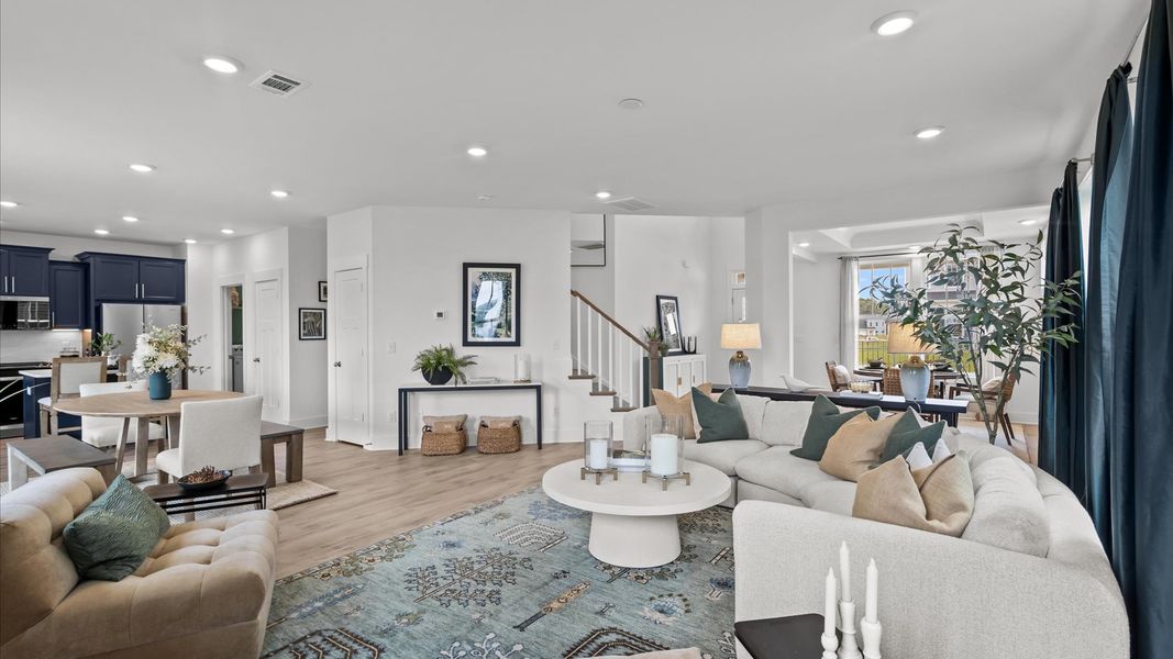 Family Room featuring generous living space and timeless architectural appeal