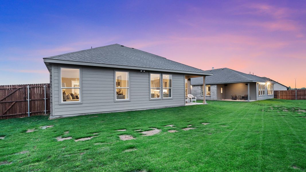 Exterior details and patio area of a home in Trails of Elizabeth Creek, Fort Worth (Image 3).