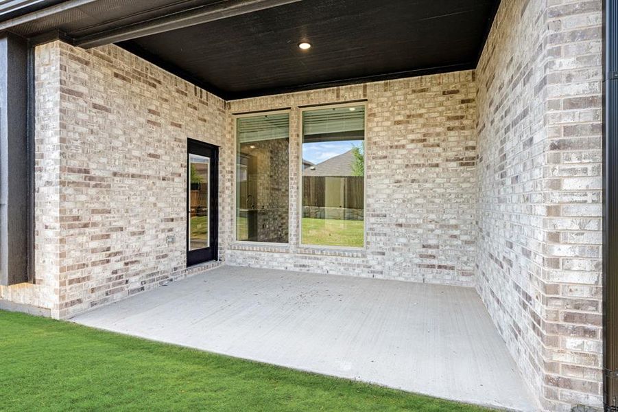 Exterior details and patio area of a home in Devonshire, Forney (Image 23).