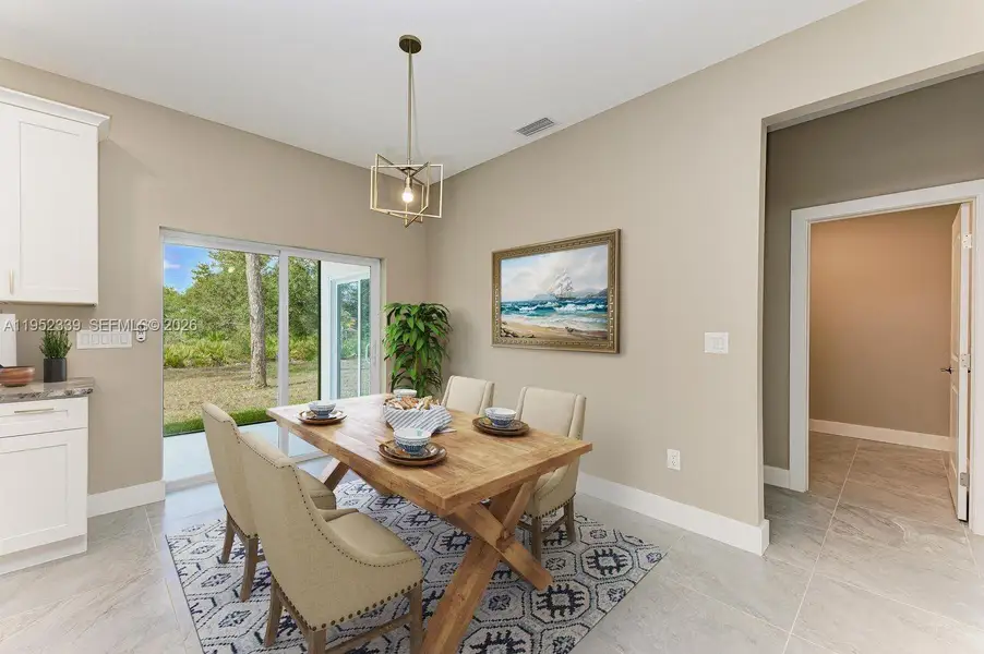 Furnished interior view inside a new home in , North Port (Image 9).
