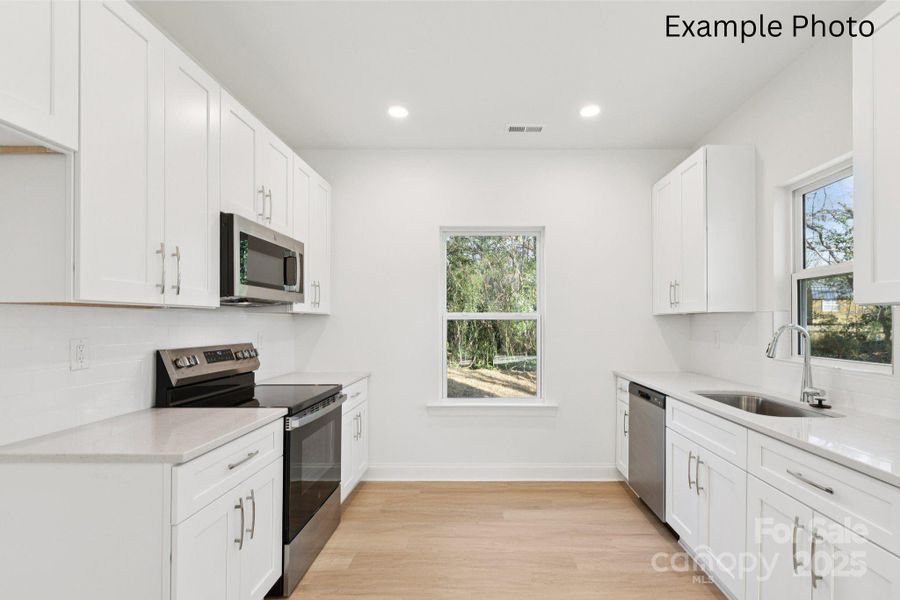 Furnished interior view inside a new home in , Charlotte (Image 6).
