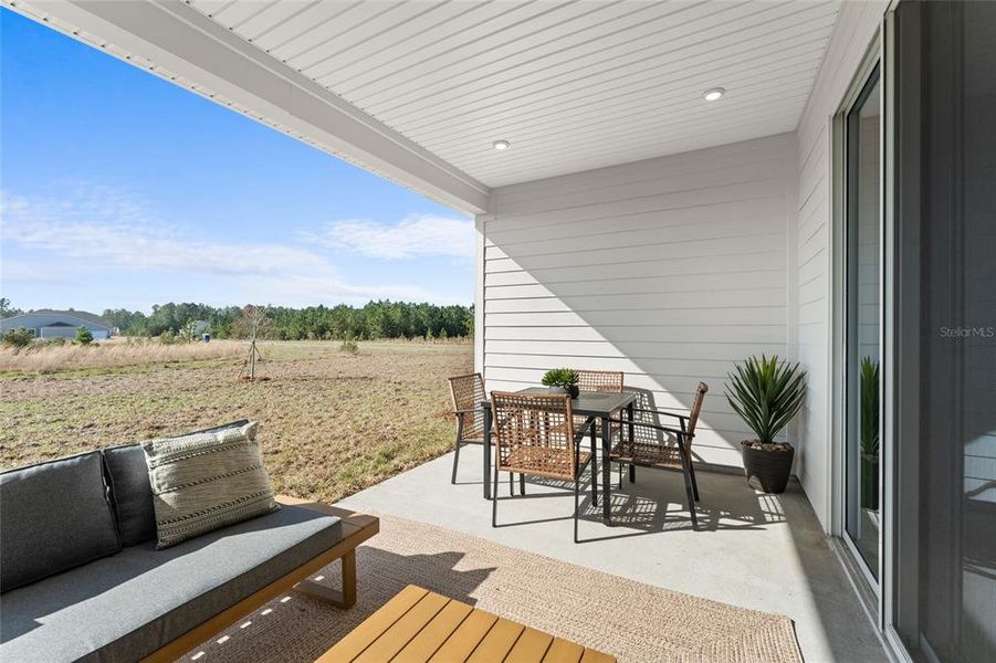 Front exterior of a new home in The Cypress Series at Reserve East, Flagler Beach, FL, highlighting curb appeal (Image 26). Front exterior of a new home in The Cypress Series at Reserve East, Flagler Beach, FL, highlighting curb appeal (Image 26).