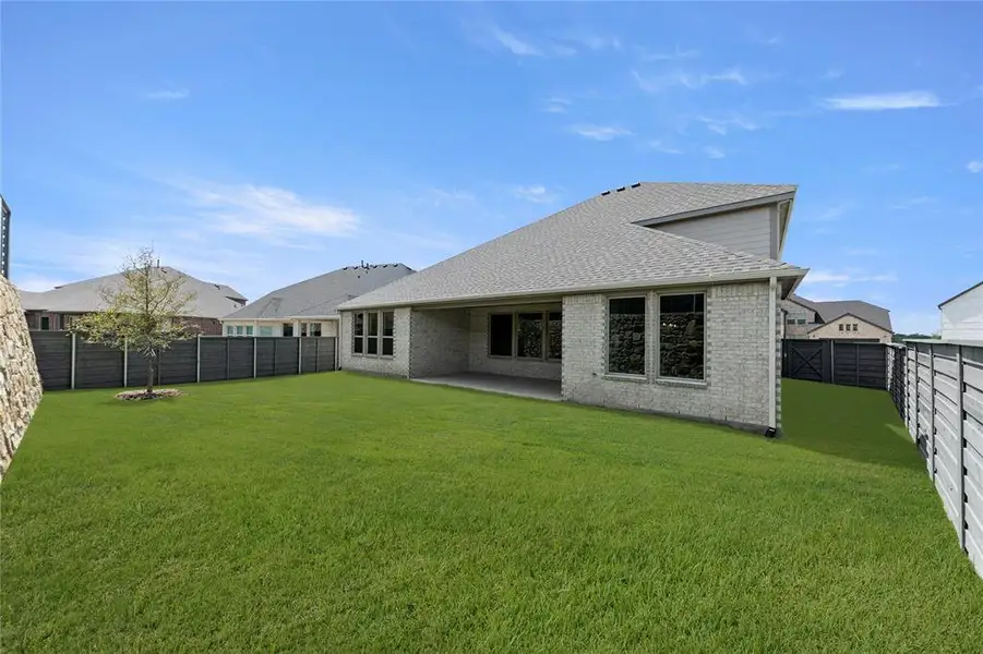 Front exterior of a new home in Inspiration Collection at Union Park, Little Elm, TX, highlighting curb appeal (Image 15). Front exterior of a new home in Inspiration Collection at Union Park, Little Elm, TX, highlighting curb appeal (Image 15).