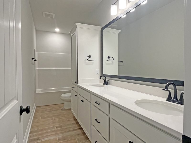 Furnished interior view inside a new home in Bird Song at Hammock Bay, Freeport (Image 9).