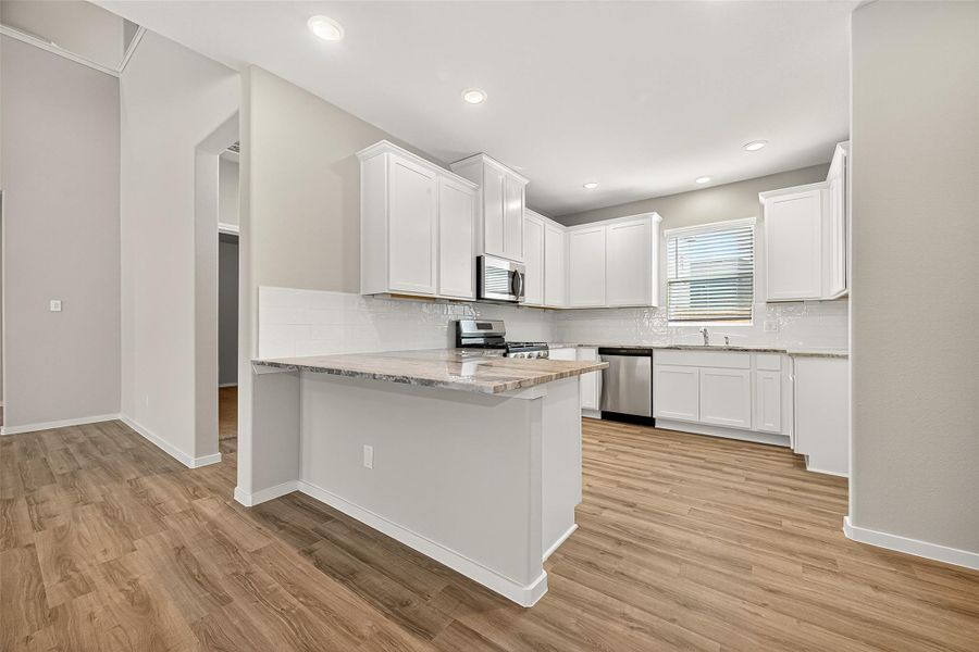 Furnished interior view inside a new home in Sunterra, Katy (Image 7). Furnished interior view inside a new home in Sunterra, Katy (Image 7).