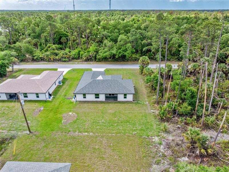 Front exterior of a new home in , Port Charlotte, FL, highlighting curb appeal (Image 13).