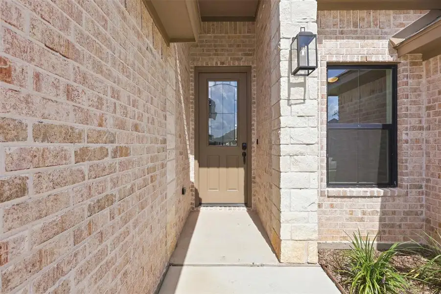 Exterior details and patio area of a home in , Springtown (Image 3).