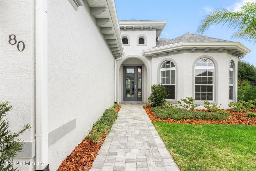 Front exterior of a new home in , Palm Coast, FL, highlighting curb appeal (Image 29). Front exterior of a new home in , Palm Coast, FL, highlighting curb appeal (Image 29).