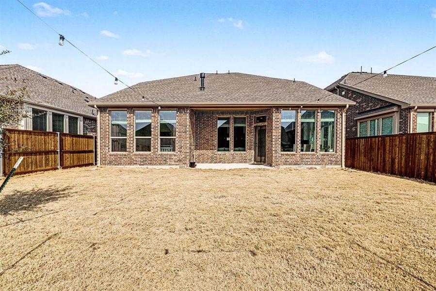 Exterior details and patio area of a home in Wildflower Ranch, Fort Worth (Image 3).