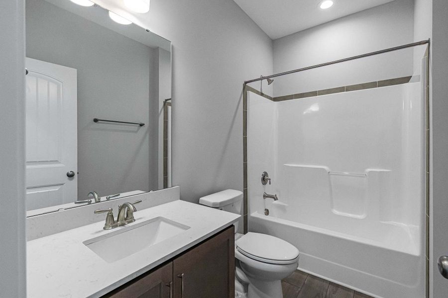 Representative furnished interior of a home built from the Weymouth by Caviness & Cates Communities in Bartlett Manor, Youngsville (Image 102).