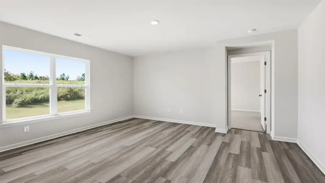 Spacious, unfurnished interior of a new home in Waverly Station, Greenwood (Image 26).