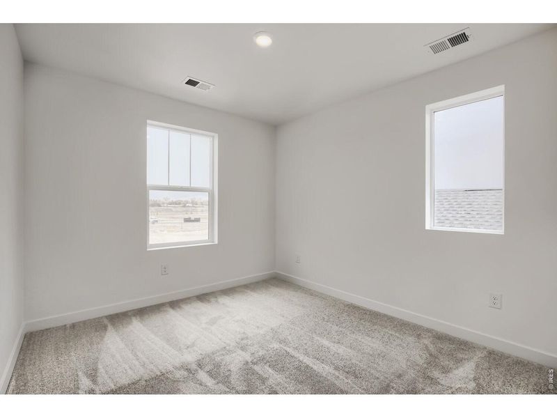 Spacious, unfurnished interior of a new home in Prairie Song, Windsor (Image 10).
