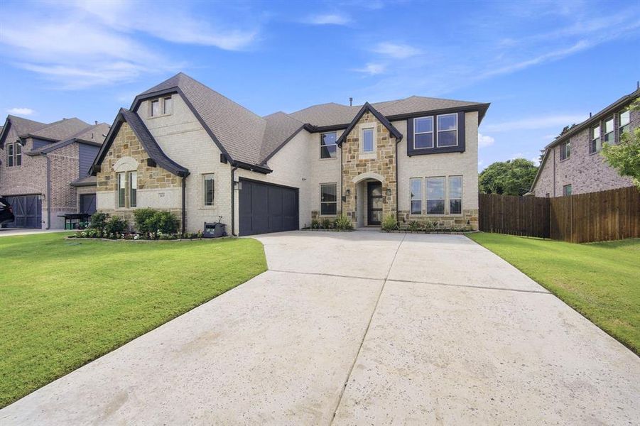 Front exterior of a new home in , Midlothian, TX, highlighting curb appeal (Image 23). Front exterior of a new home in , Midlothian, TX, highlighting curb appeal (Image 23).