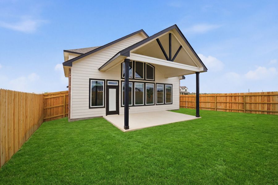 Exterior details and patio area of a home in Megan's Landing, Castroville (Image 4).