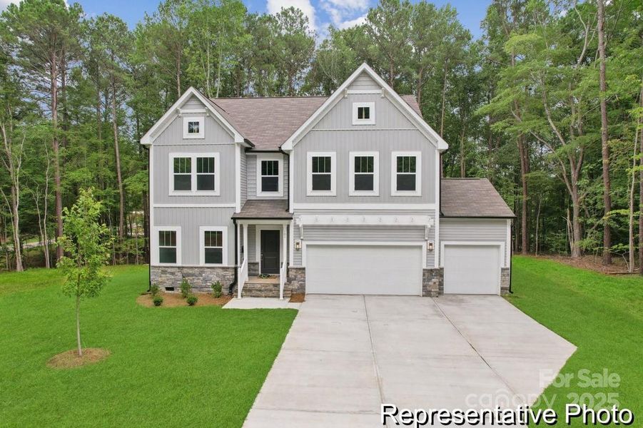 Front exterior of a new home in , Statesville, NC, highlighting curb appeal (Image 1). Front exterior of a new home in , Statesville, NC, highlighting curb appeal (Image 1).