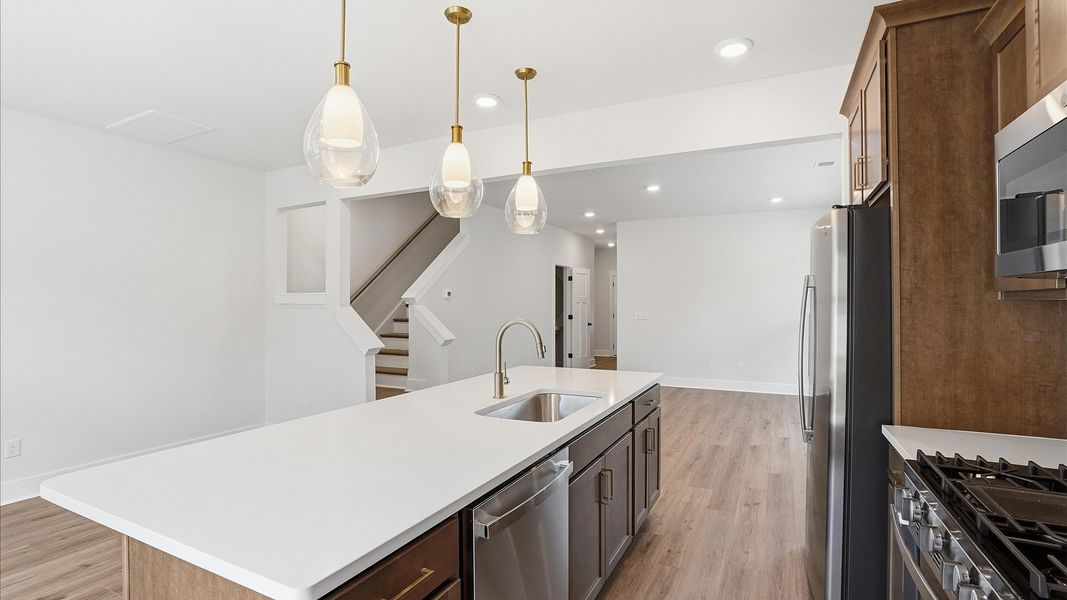 Superior craftsmanship shines in this modern kitchen with a center island and open flow located near Downtown Greenville Superior craftsmanship shines in this modern kitchen with a center island and open flow located near Downtown Greenville