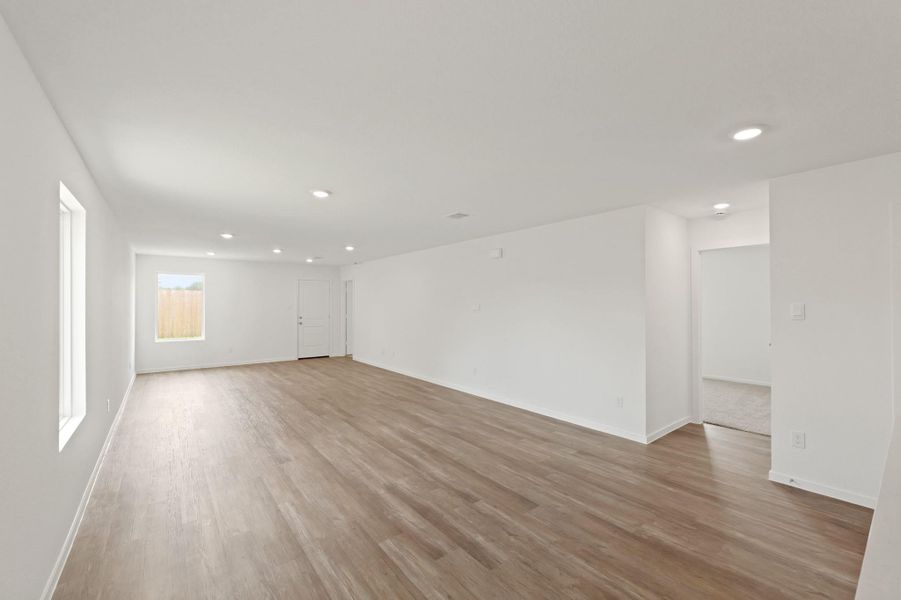 Spacious, unfurnished interior of a new home in The Canopies, Splendora (Image 11).