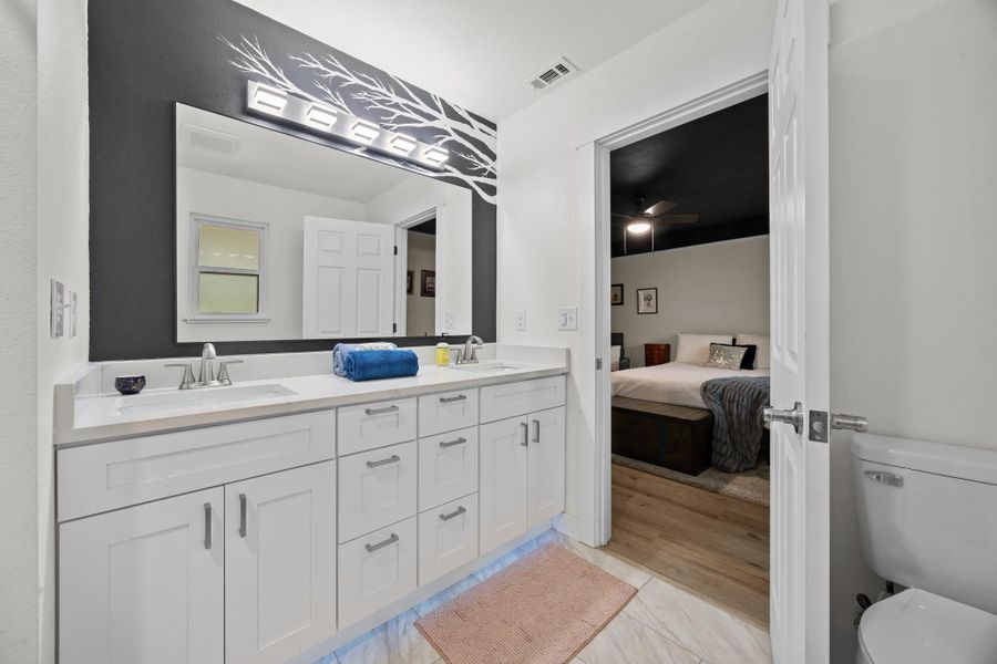 Dual vanities and plenty of storage,