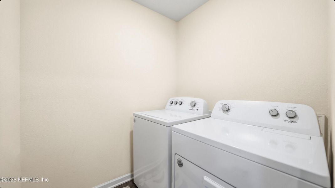 Furnished interior view inside a new home in River Glen Express, Yulee (Image 8).