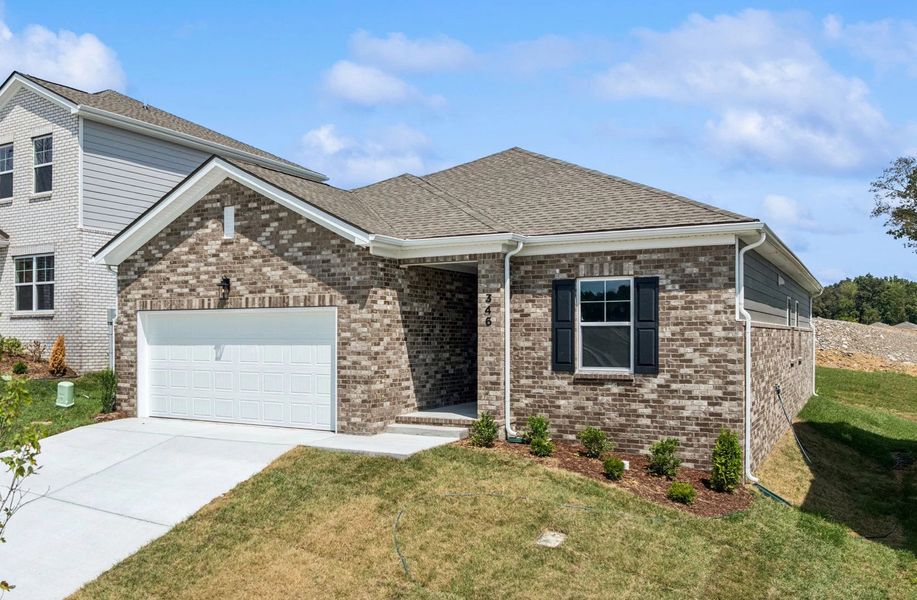 Front exterior of a new home in Cades Bluff, Lebanon, TN, highlighting curb appeal (Image 18).