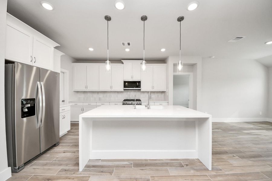 Furnished interior view inside a new home in Laurel Landing: Landmark Collection, Alvin (Image 10). Furnished interior view inside a new home in Laurel Landing: Landmark Collection, Alvin (Image 10).