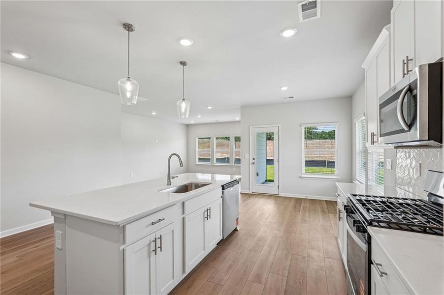 Furnished interior view inside a new home in Northwoods at Mirror Lake, Villa Rica (Image 8).