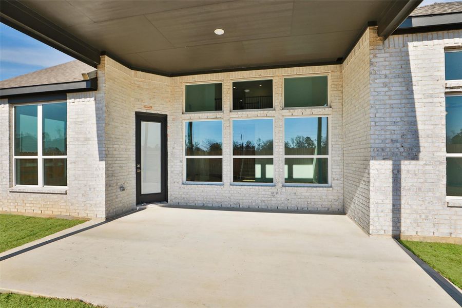 Exterior details and patio area of a home in Sundance Cove, Crosby (Image 3). Exterior details and patio area of a home in Sundance Cove, Crosby (Image 3).