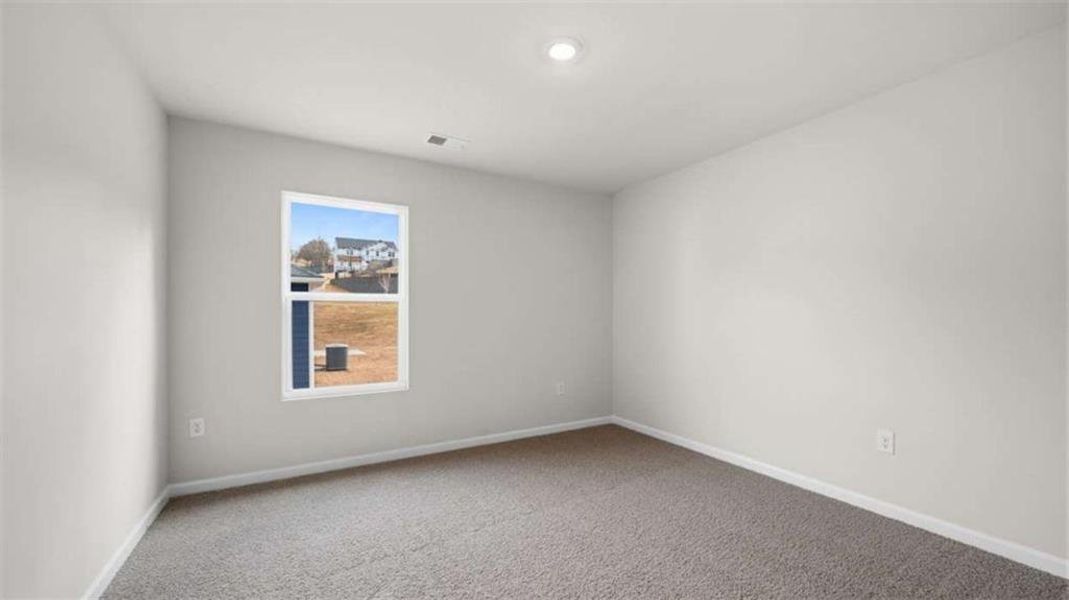 Spacious, unfurnished interior of a new home in Brooks Station, Dacula (Image 30).