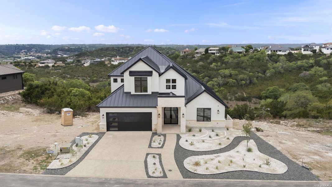 Front exterior of a new home in , Boerne, TX, highlighting curb appeal (Image 32).