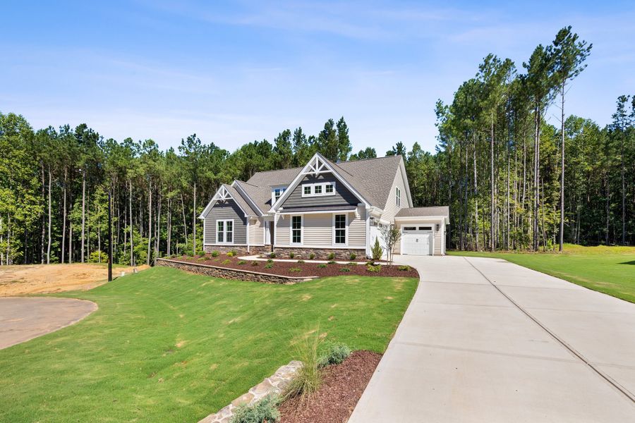 Representative exterior photo of a completed home built from the The Bradley by RobuckHomes in Baylee Ridge, Selma, NC (Image 44). Representative exterior photo of a completed home built from the The Bradley by RobuckHomes in Baylee Ridge, Selma, NC (Image 44).