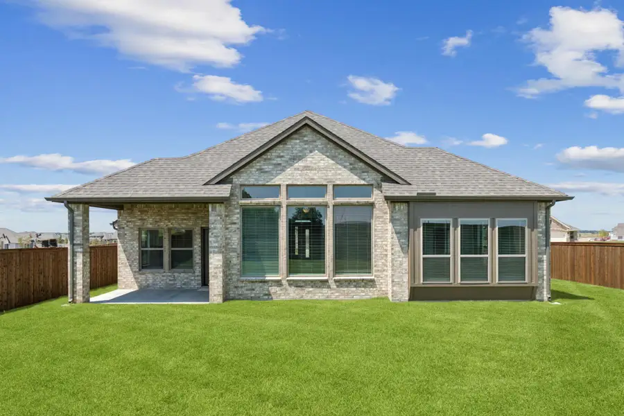 Exterior details and patio area of a home in Silo Mills, Joshua (Image 3).