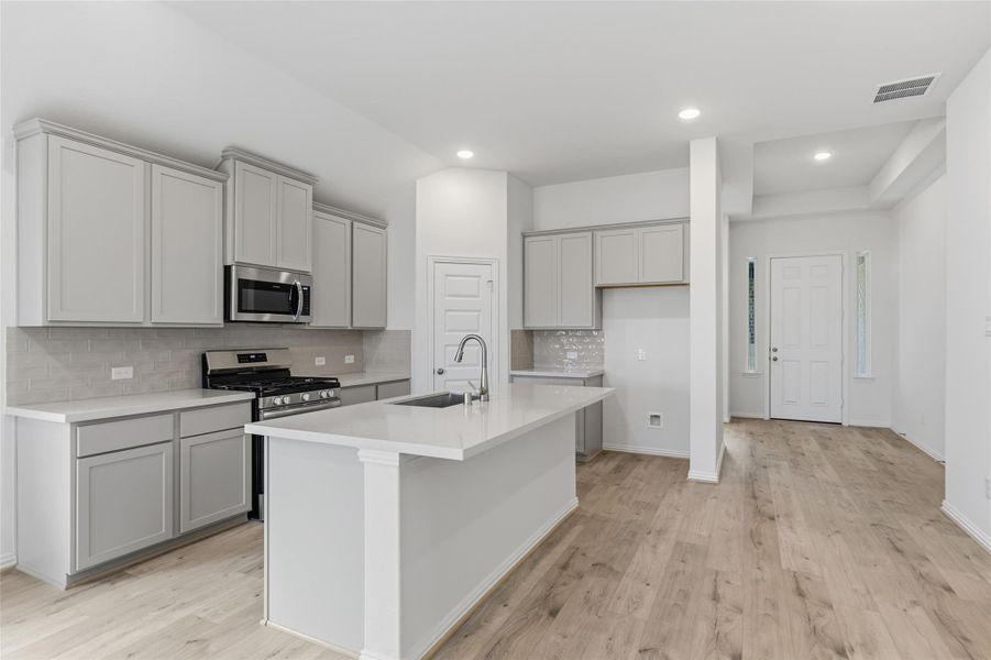 Furnished interior view inside a new home in Westland Ranch, League City (Image 13).