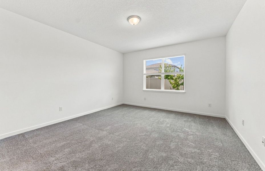 Spacious, unfurnished interior of a new home in Vida's Way, Wesley Chapel (Image 15).