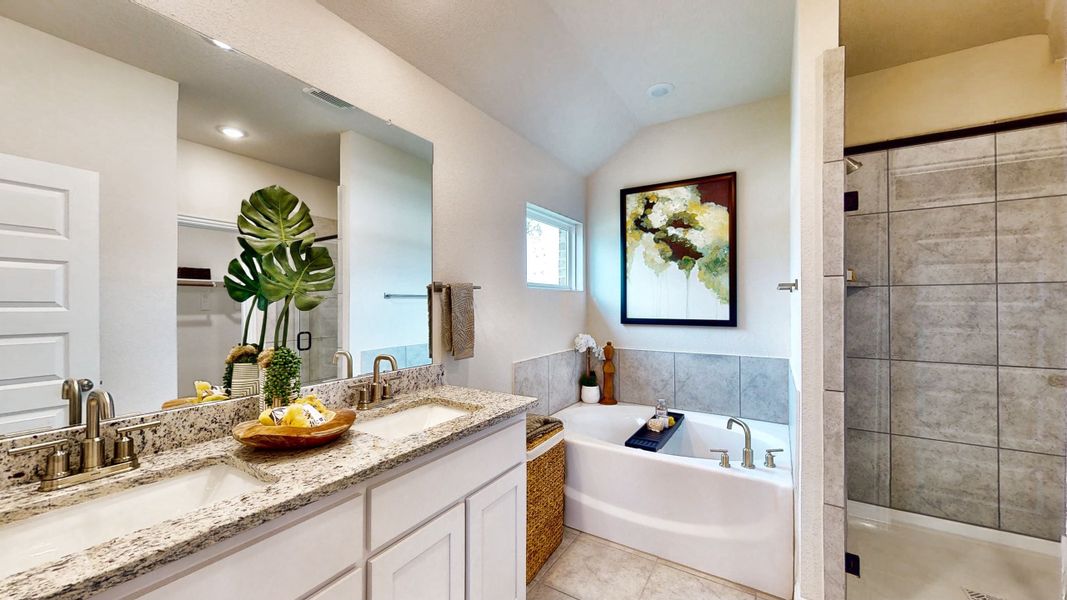 A bathroom with a tub sink and a bathtub. A bathroom with a tub sink and a bathtub.