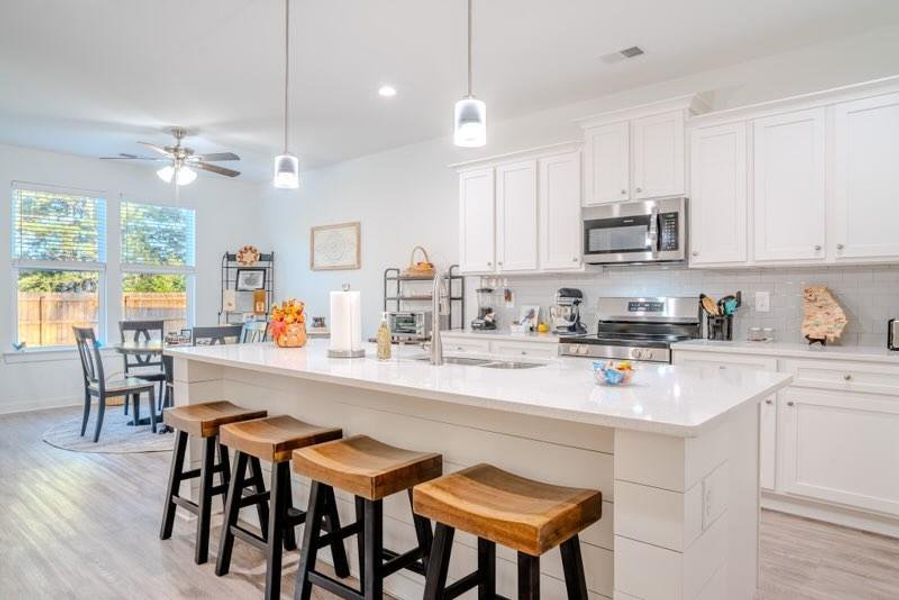 Furnished interior view inside a new home in Crossing Creeks, Monroe (Image 16).