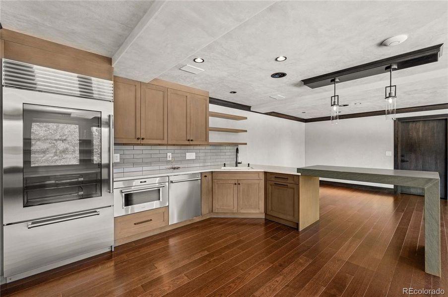 Lower level recreational room with kitchen area Lower level recreational room with kitchen area